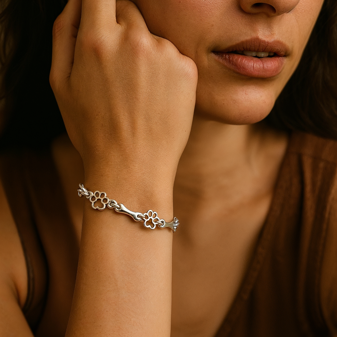 Silver Bracelet Featuring Dog Paw and Bone Charms