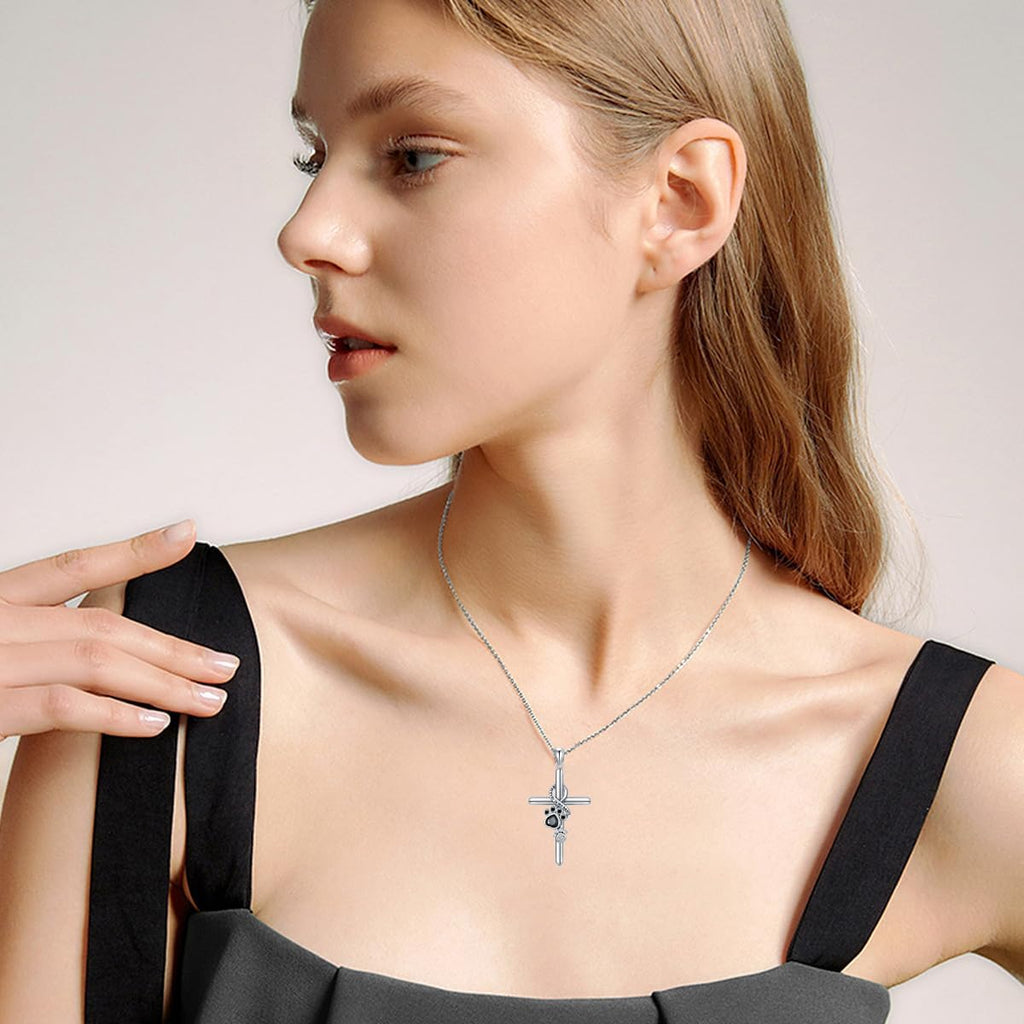 Silver Pendant Featuring Paw Print and Cross Design