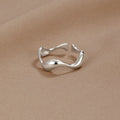 Elegant Silver Wave Band