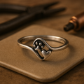 Classic Silver Ring Featuring Paw Print and Heart Design