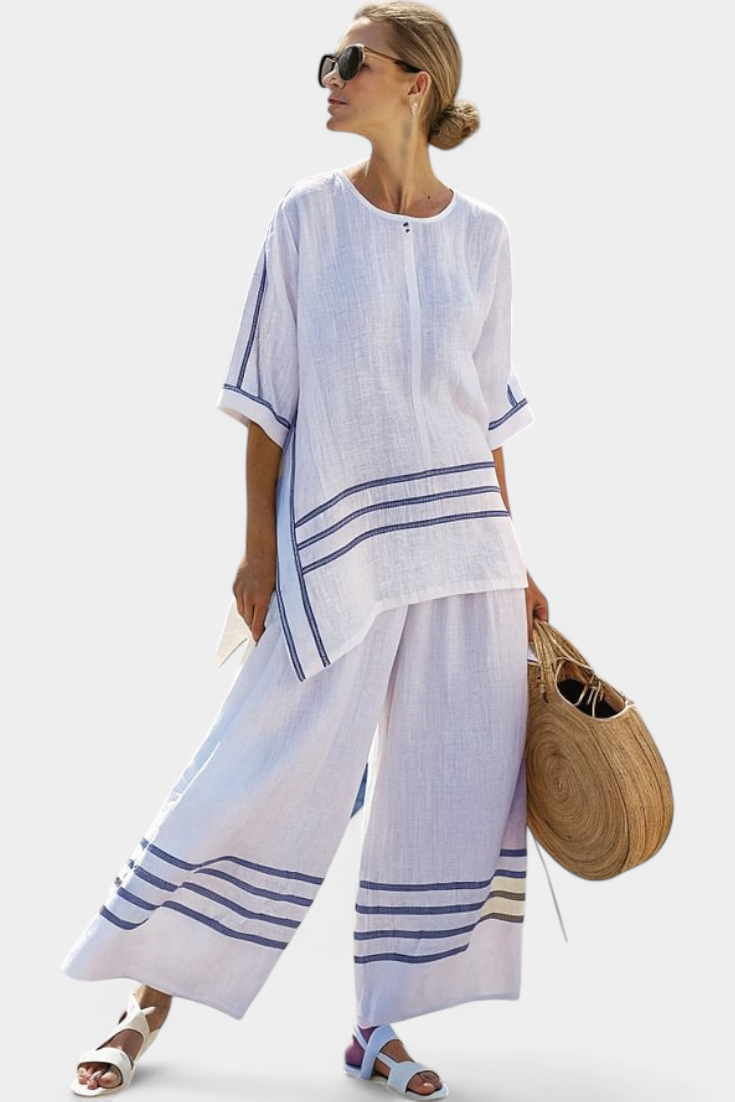 Vittorina – sophisticated asymmetric striped top and bold trousers