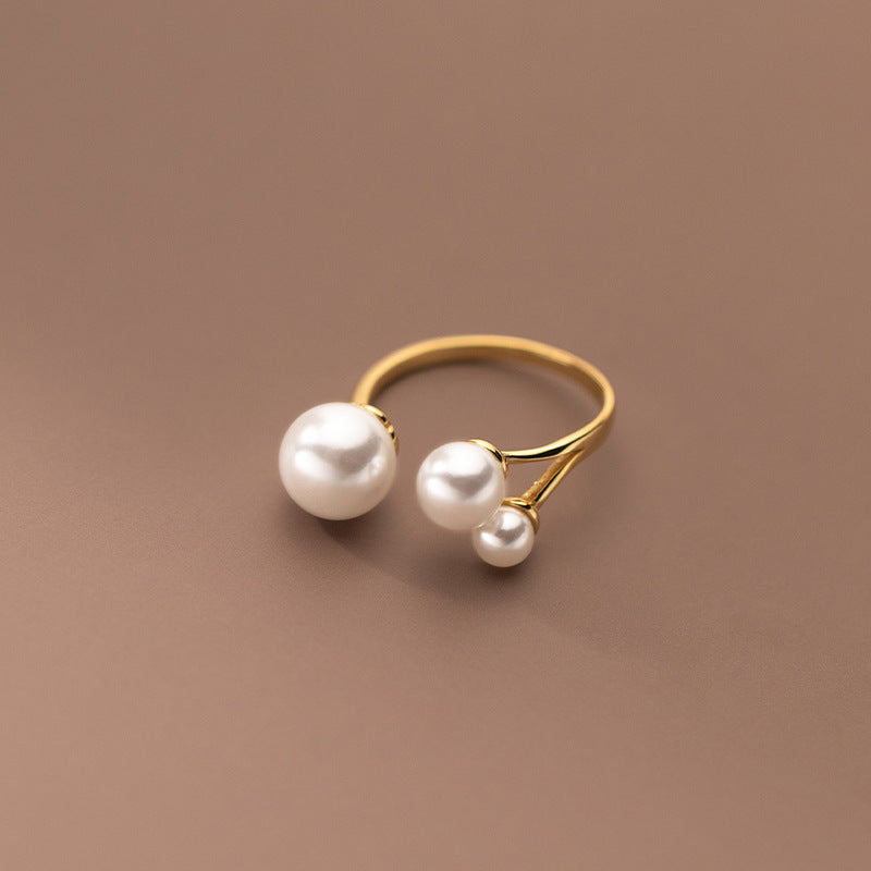 Adjustable Ring Featuring Three Freshwater Pearls