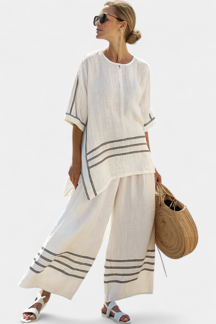 Vittorina – sophisticated asymmetric striped top and bold trousers