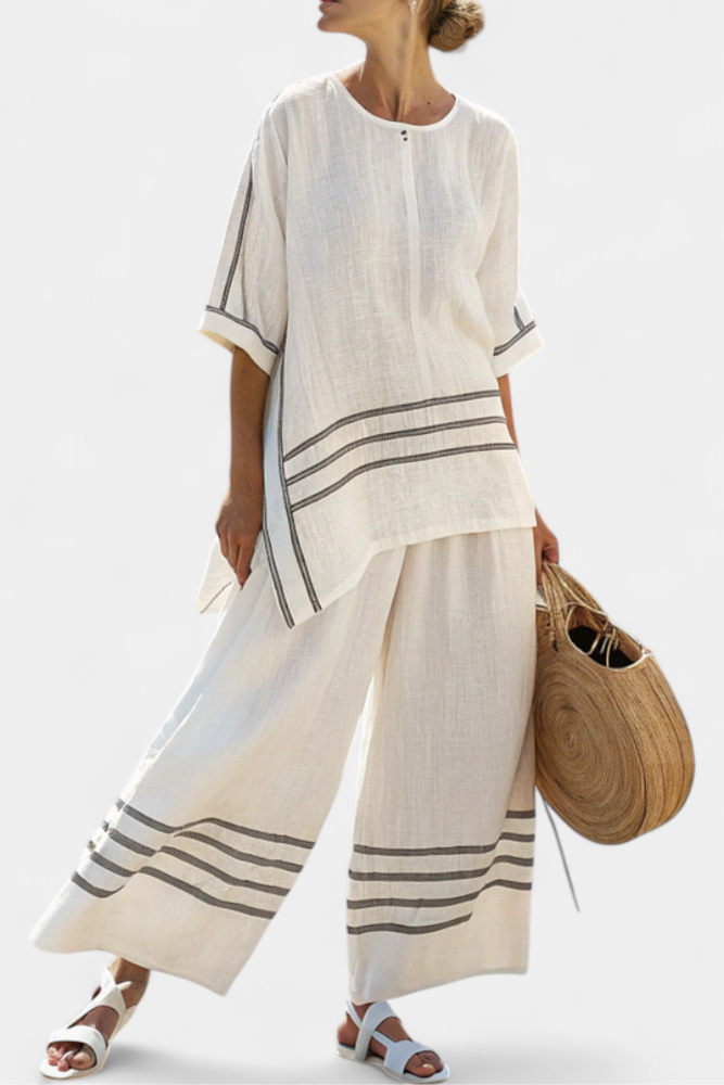 Vittorina – sophisticated asymmetric striped top and bold trousers