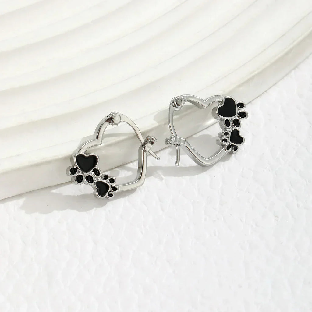 Heart-Shaped Huggie Earrings with Black Enamel