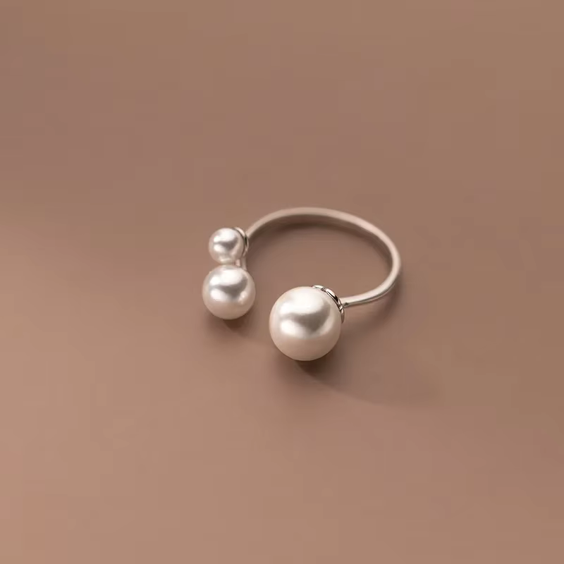 Adjustable Ring Featuring Three Freshwater Pearls