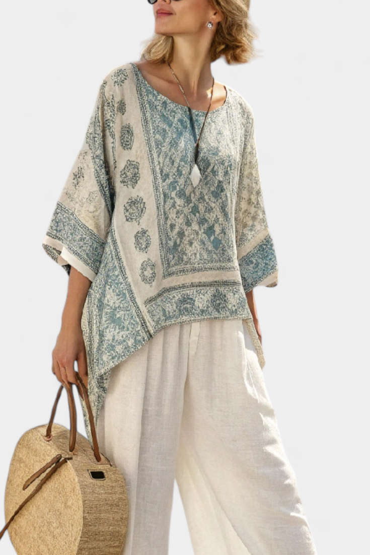 Annalisa – comfortable printed blouse and wide-leg white trousers