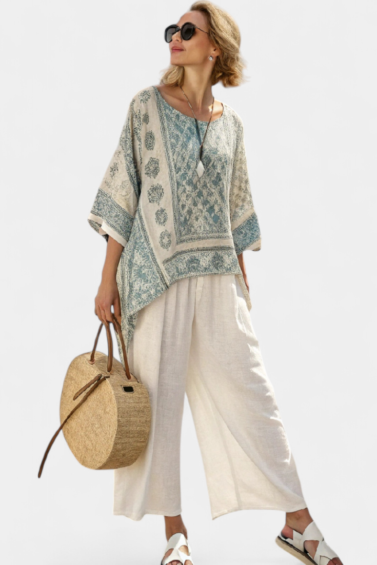 Annalisa – comfortable printed blouse and wide-leg white trousers