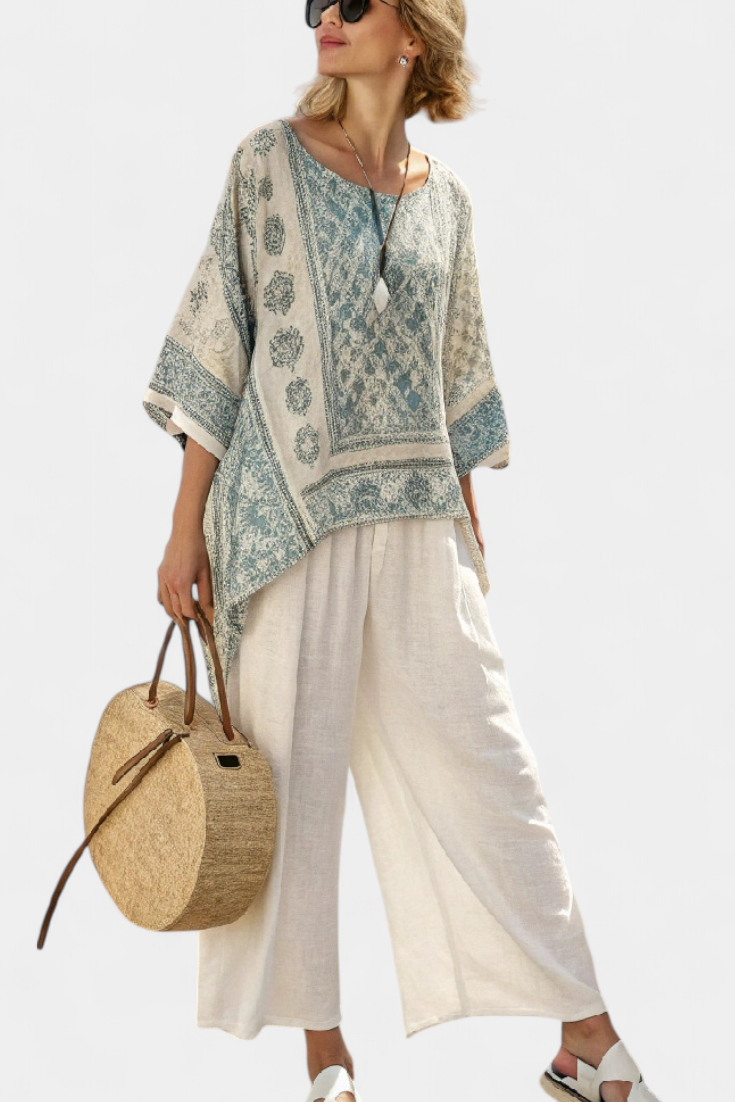 Annalisa – comfortable printed blouse and wide-leg white trousers