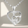 Sterling Silver Paw Print and Heart Necklace Adorned with Zirconia