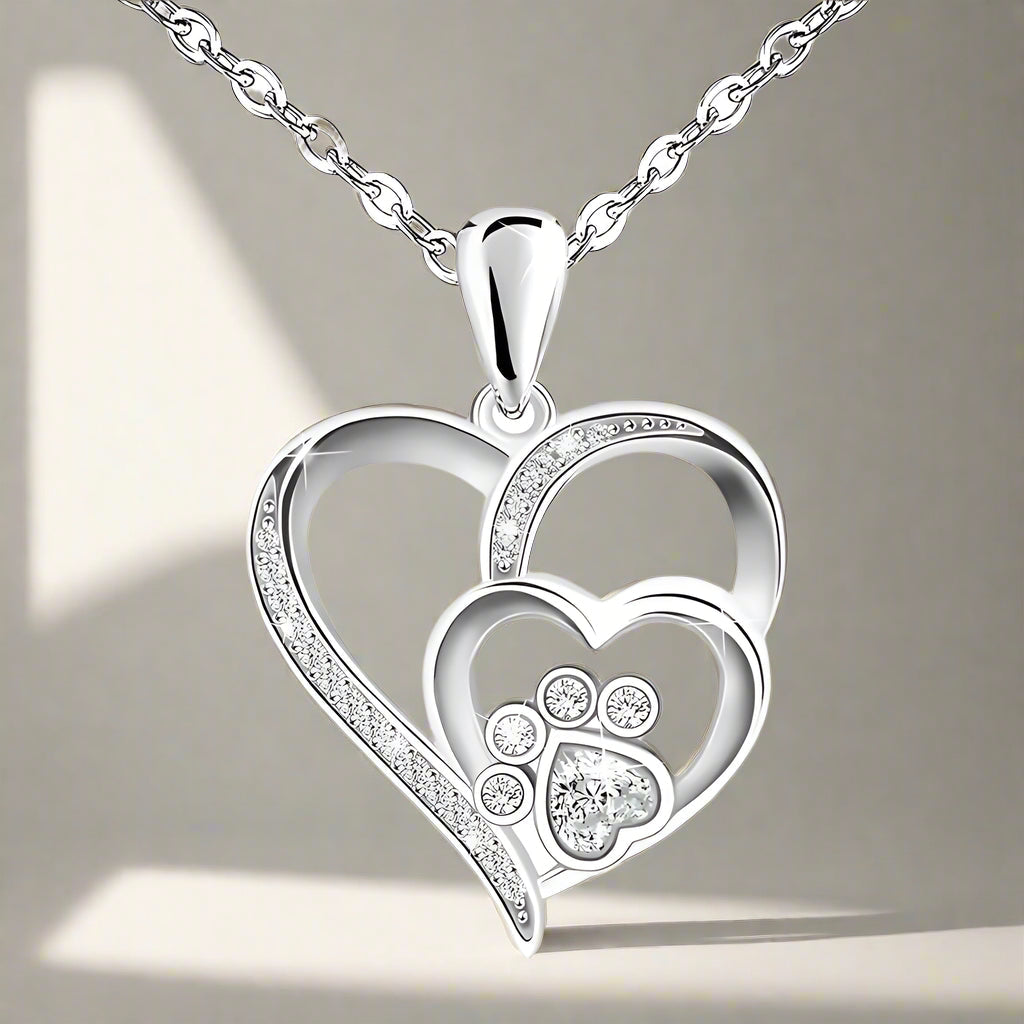 Sterling Silver Paw Print and Heart Necklace Adorned with Zirconia